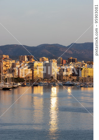 Boats in a Marina with Downtown City Buildings by Balearic Sea. Palma, Balearic Islands, Spain. Boats in a Marina with Downtown City Buildings by Balearic Sea. Palma, Balearic Islands, Spain. 95903081
