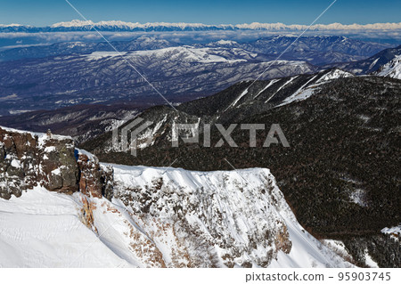Kirigamine and the Northern Alps mountain range seen from Yatsugatake mountain range and Iodake in winter 95903745