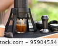 Close-up shot of Slowbar coffee maker. 95904584