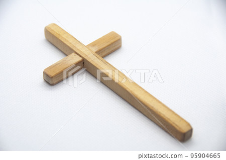 Wooden Cross on white cover background representing Good Friday, Lent Season and Holy Week concept. 95904665