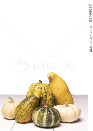 Some colorful pumpkins 95904987