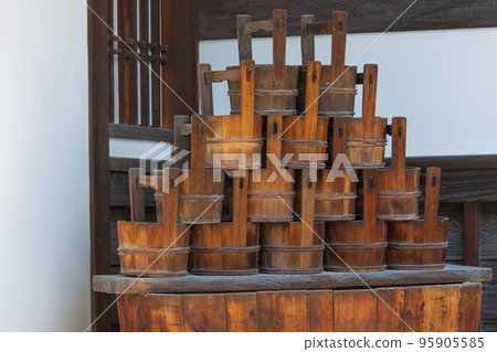 wooden pails stacked 95905585