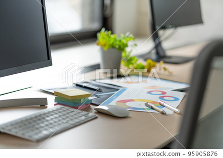 Business items spread out on the office desk Business items spread out on the office desk 95905876