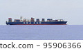 Big Container  cargo ship  leaving port  after loading unloading operations 95906366