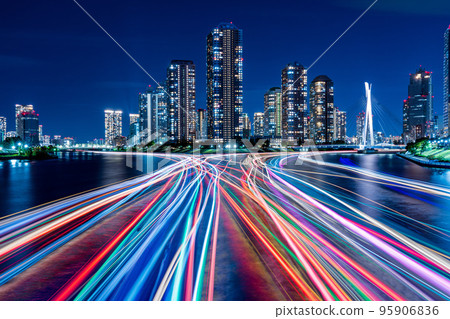 A group of condominiums and light trails of houseboats seen from Eitai Bridge in Tokyo A group of condominiums and light trails of houseboats seen from Eitai Bridge in Tokyo 95906836