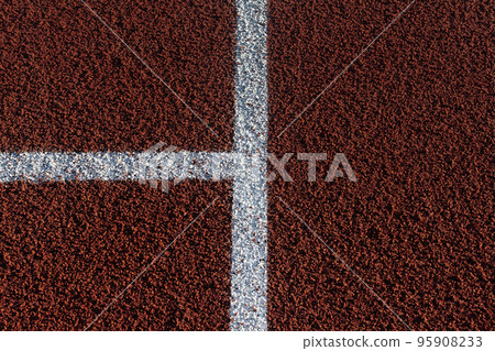 background red running track stadium with white markings background red running track stadium with white markings 95908233