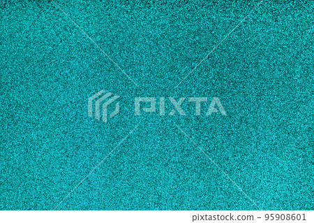 Festive blue glitter christmas background. Glittering surface with glow effect Festive blue glitter christmas background. Glittering surface with glow effect 95908601