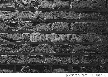 Black brick wall texture background. Pattern of weathered old cracked brickwall. 95908782