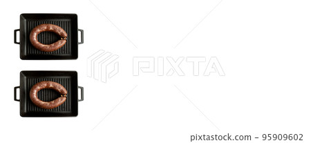 Homemade kangal sucuk made from spice mixtures used in Turkish cuisine in a heavy black cast iron grill pan Homemade kangal sucuk made from spice mixtures used in Turkish cuisine in a heavy black cast iron grill pan 95909602