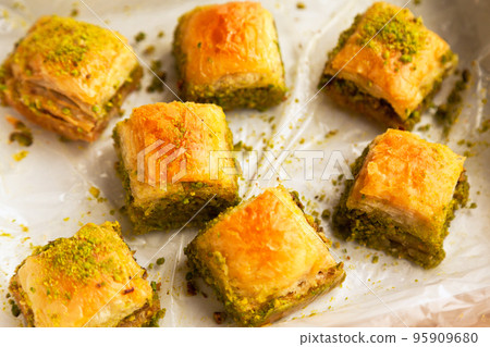 Baklava with pistachio, one of the most beautiful desserts of Turkish cuisine, Turkish baklava in the package 95909680