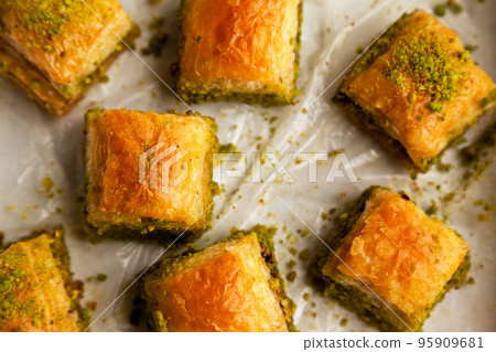 Baklava with pistachio, one of the most beautiful desserts of Turkish cuisine, Turkish baklava in the package 95909681