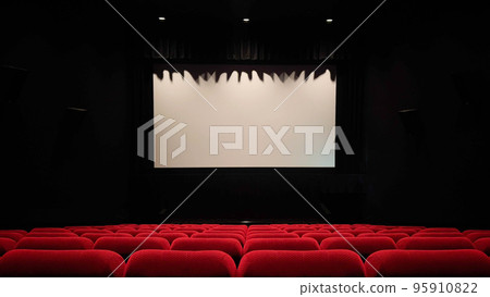 Cinema screen and red seating seats Cinema screen and red seating seats 95910822