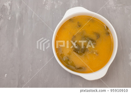 vegetable soup with crackers in white bowl on ceramic vegetable soup with crackers in white bowl on ceramic 95910910