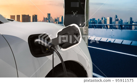 Eco friendly progressive clean energy concept with EV car with cityscape scenery 95911575