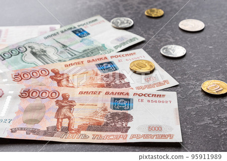 Russian rubles on a dark background 95911989