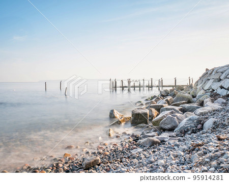 Pillars and poles of port mole in fishing Village of Vitt near Kap Arkona 95914281