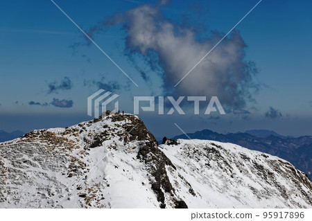 Mt. Higashi Tengu, Mt. Ryokami and Mt. Goza seen from Mt. Nishi Tengu in winter 95917896
