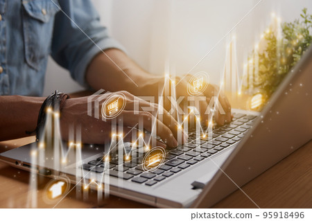 Casual Businessman Typing Laptop and Slant Online Products Stock Market Bar Chart or Graph Trend 95918496