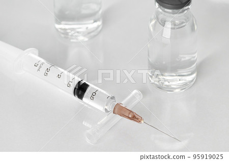 Medicine vials and syringes in the laboratory- Health Beauty and medical concepts- Isolated on white background 95919025