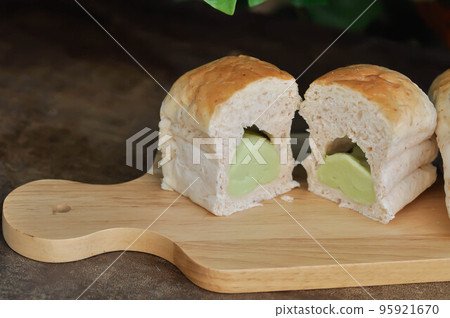 bread, thai custard bun or thai pandanus custard, thai pandanus custard bun, topping, touch food  bread or bun with custard stuffed or steamed custard bun 95921670
