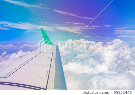 The view from the plane Blue sky, white clouds and wings The view from the plane Blue sky, white clouds and wings 95922446