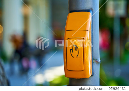 Close-up, yellow button to switch traffic lights Close-up, yellow button to switch traffic lights 95926481