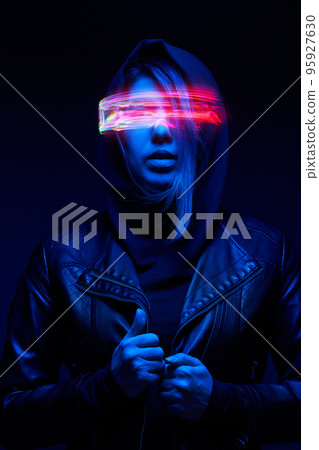 Woman is using augmented reality headset. Concept of virtual, augmented and extended reality. 95927630