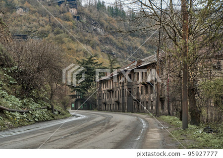 Abandoned crumbling buildings in a residential city. A dying city. Frightening atmosphere 95927777