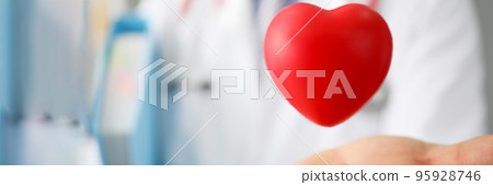 Doctor hand holding red plastic heart, save life 95928746