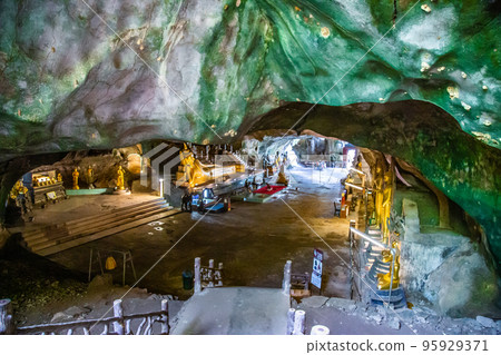 Wat Suwan Khuha temple in the cave with buddha statues, in Phang Nga, Thailand 95929371