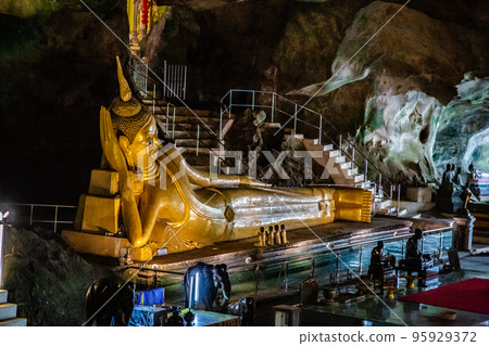Wat Suwan Khuha temple in the cave with buddha statues, in Phang Nga, Thailand 95929372