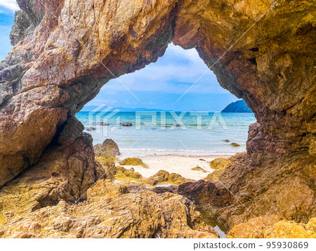Koh Phayam beach Hin Talu with rock arch formation in Ranong, Thailand. 95930869