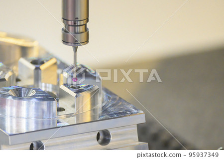 The CMM machine measuring the aluminum parts. The CMM machine measuring the aluminum parts. 95937349