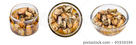 Marinated mussels isolated in a jar on a white background. Full depth of field. 95938394