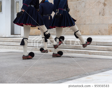 Greek Evzone soldiers in traditional costumes 95938583