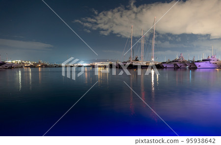 many ships at night on the pier in the Aegean Sea Athens Greece many ships at night on the pier in the Aegean Sea Athens Greece 95938642
