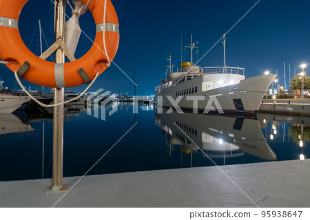 many ships at night on the pier in the Aegean Sea Athens Greece 95938647
