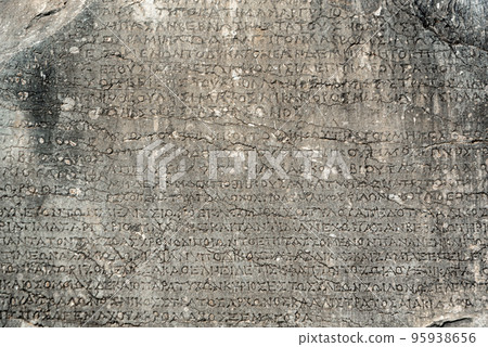 ancient greek letters in stone abstract background ancient greek letters in stone abstract background 95938656
