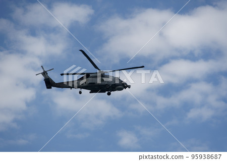 Sikorsky Seahawk naval military helicopter during an air show. Hellenic Navy S-70 flying on Thessaloniki, Greece during the 28 October National Oxi Day parade. Sikorsky Seahawk naval military helicopter during an air show. Hellenic Navy S-70 flying on Thessaloniki, Greece during the 28 October National Oxi Day parade. 95938687