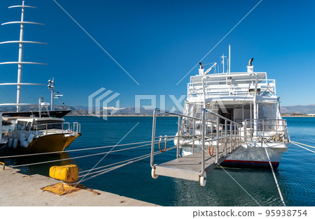 boat moored in the Aegean Sea in Greece boat moored in the Aegean Sea in Greece 95938754