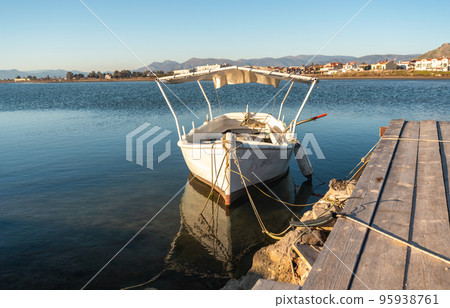 boat moored in the Aegean Sea in Greece boat moored in the Aegean Sea in Greece 95938761