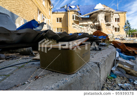 destroyed and burned houses in the city during the war in Ukraine 95939378