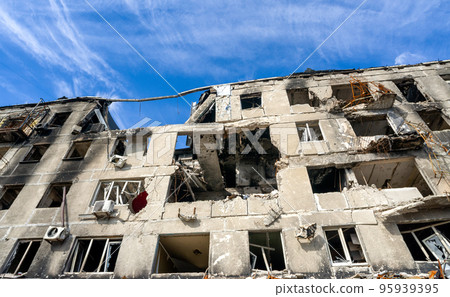 destroyed and burned houses in the city during the war in Ukraine destroyed and burned houses in the city during the war in Ukraine 95939395