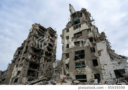 destroyed and burned houses in the city during the war in Ukraine destroyed and burned houses in the city during the war in Ukraine 95939399