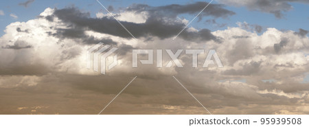 Autumn sky with dark colors and gray clouds and rain-laden. Beautiful background yellow grey gradient colors. Autumn sky with dark colors and gray clouds and rain-laden. Beautiful background yellow grey gradient colors. 95939508