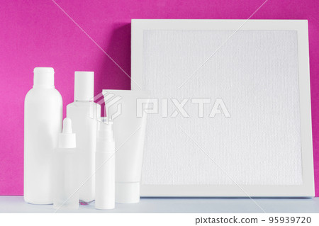 Beauty cosmetic products mockup. Mock up skin care product. Canvas frame board. Cream lotion spray serum oil bottles. 95939720