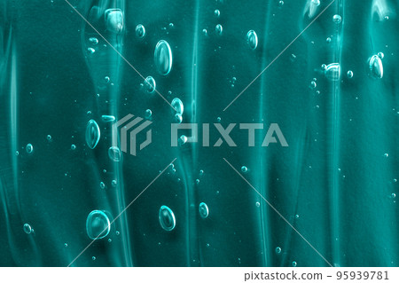 Green gel texture smear with bubble. Transparent beauty serum cosmetic product. Skincare cleanser smudge. Abstract cosmetic texture background. Tidewater green texture. . Green gel texture smear with bubble. Transparent beauty serum cosmetic product. Skincare cleanser smudge. Abstract cosmetic texture background. Tidewater green texture. . 95939781