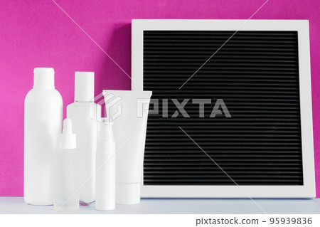 Beauty cosmetic products mockup. Mock up skin care product. Black frame board. Cream lotion spray serum oil bottles. Beauty cosmetic products mockup. Mock up skin care product. Black frame board. Cream lotion spray serum oil bottles. 95939836