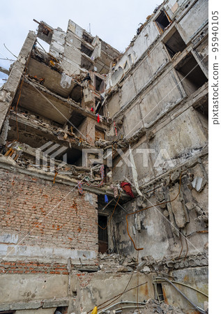 destroyed and burned houses in the city during the war in Ukraine destroyed and burned houses in the city during the war in Ukraine 95940105
