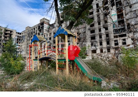 destroyed and burned houses in the city during the war in Ukraine 95940111